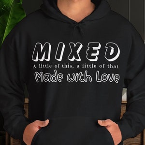 May include: Black hooded sweatshirt with white text that reads "MIXED A little of this, a little of that Made with Love"
