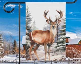 May include: A watercolour painting of a brown deer with antlers standing in a snowy forest. The deer is looking to the right. The background is a snowy forest with pine trees. The image is a garden flag.