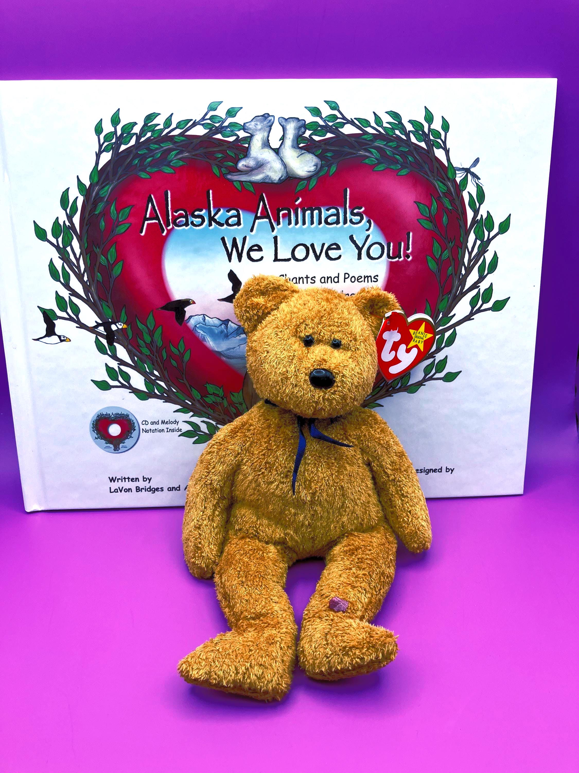 Beanie Baby Bear + book of animal songs & poems; Alaska Animals We Love You.  CD, glossary, music notation.  Fun, educational.  Fantastic!