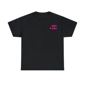 May include: Black short-sleeved t-shirt with pink text that reads "pipis & pipa" on the front.