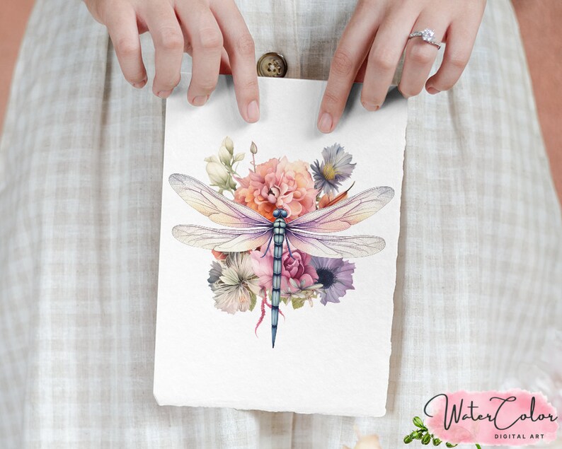 May include: Watercolor illustration of a dragonfly with blue and purple wings, surrounded by a bouquet of pink, white, and orange flowers.