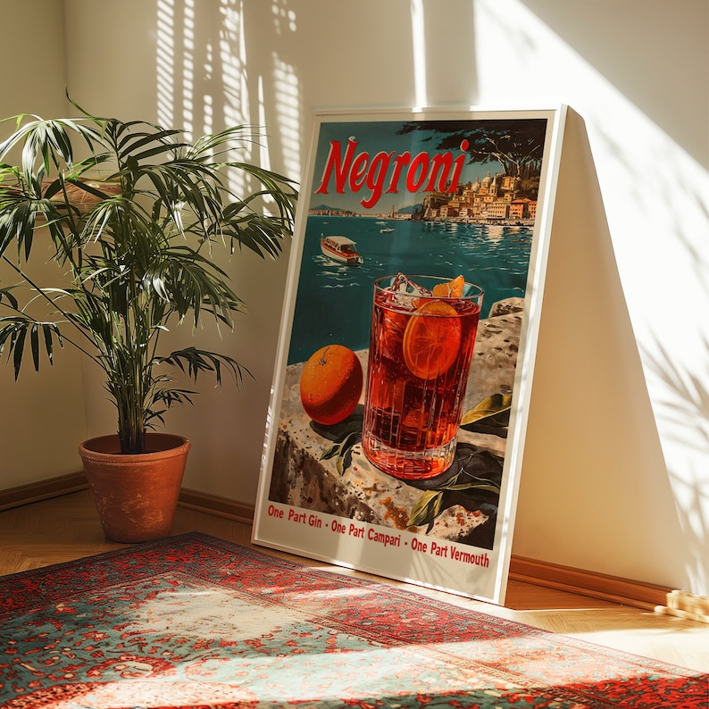 May include: A vintage poster advertising Negroni, a classic Italian cocktail. The poster features a glass of Negroni with ice and an orange slice, along with a scenic view of a harbour. The text on the poster reads "Negroni" and "One Part Gin - One Part Campari - One Part Vermouth."