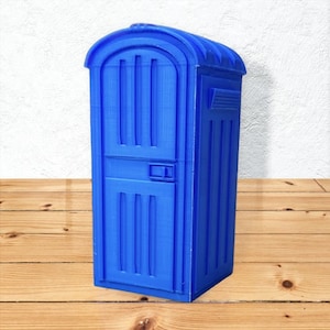 May include: A blue plastic portable toilet with a door and a small window. The toilet is on a wooden floor.