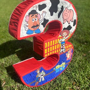 Piñata con número de Jessie, temática de Toy Story imagen 5