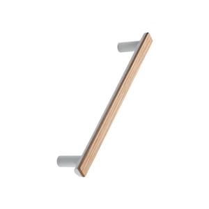 May include: A modern cabinet pull with a light wood grain centre and grey metal ends. The rectangular wood section is angled, creating a sleek, contemporary design. The hardware is designed for easy installation.