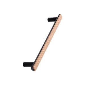 May include: A contemporary cabinet pull featuring a light wood grain centre and black detailing. The pull has a minimalist design, with black handles at each end. The wood grain provides a warm contrast to the otherwise industrial aesthetic. The pull is approximately 20 cm long.