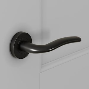 May include: A black door handle with a curved lever, mounted on a white door. The handle has a circular base and a sleek, modern design. The door also features a black strike plate and a gold-coloured latch.