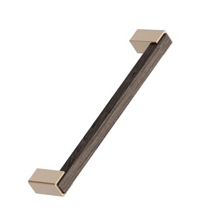 May include: A cabinet pull with a rectangular wooden centre and gold-coloured end caps. The wood grain is visible in the centre section. The hardware is designed for furniture and cabinetry.