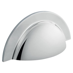 May include: A polished chrome cabinet pull with a curved, half-moon shape. The hardware has a smooth, reflective surface, and is designed for easy gripping. This modern pull is suitable for drawers and cabinets.