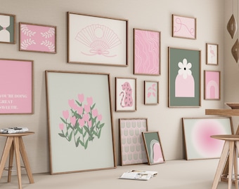 May include: A gallery wall featuring 14 framed prints in a variety of sizes and designs. The prints include abstract shapes, floral patterns, and text. One print reads "You're doing great sweetie."