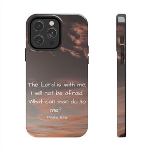May include: A phone case with a sunset sky background and the text "The Lord is with me; I will not be afraid. What can man do to me? Psalm 118:6"