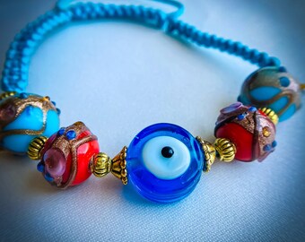 Adjustable Macrame Bracelet with Rare to Find Evil Eye Beads, Unisex handmade Jewelry, Protection, Blue color Macrame Cord. Beadcraft.