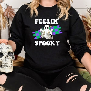 Feelin&#39; Spooky, Funny Halloween Sweatshirt and T-Shirt, Ghost and Retro Checkered Background, Halloween Gift, Spooky Season