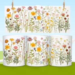 May include: Three white ceramic mugs with a pressed flower design. The design features a variety of dried flowers in shades of pink, yellow, white, and orange.