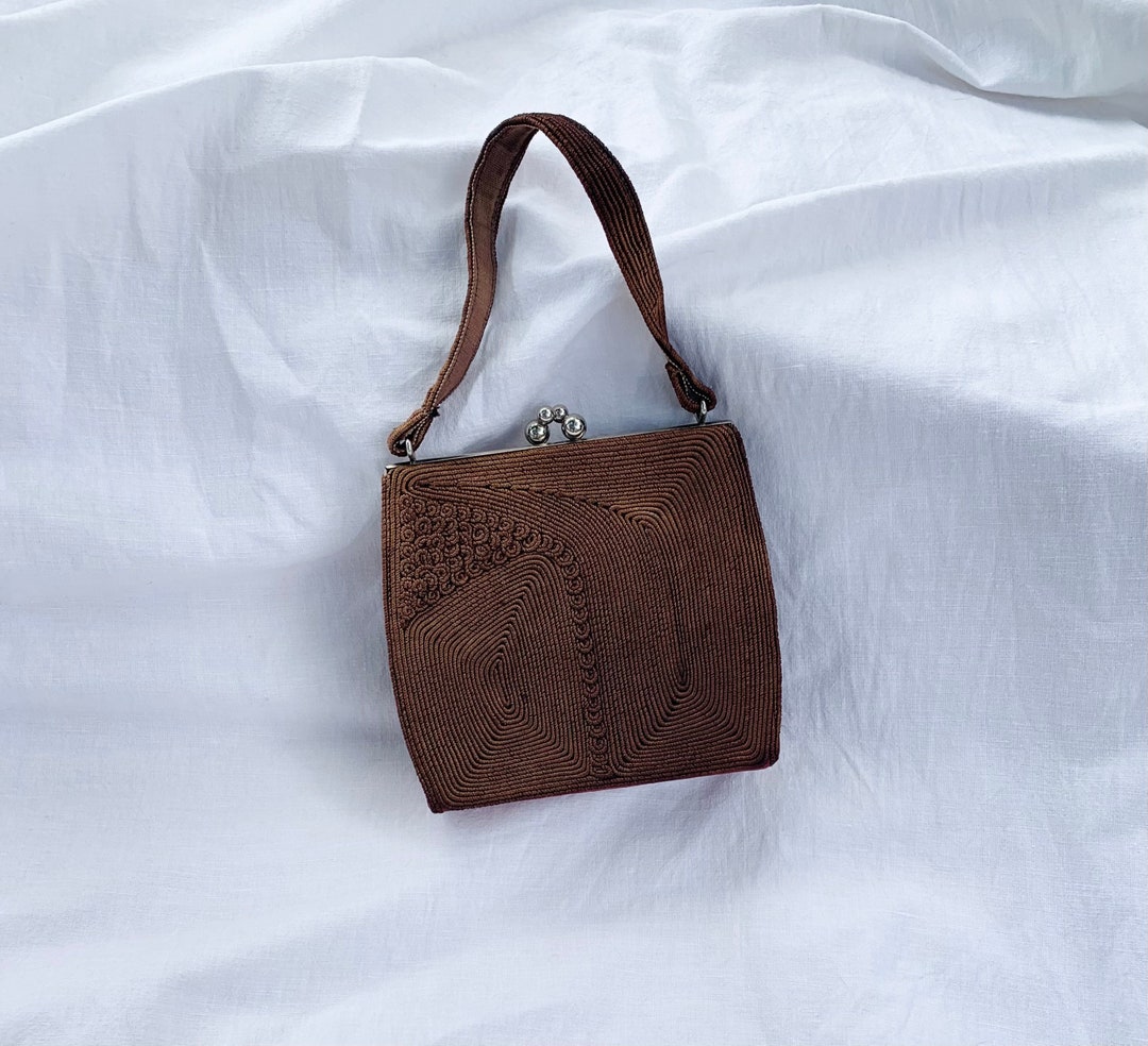 Bolso de chocolate texturizado MCM de los años 50 España