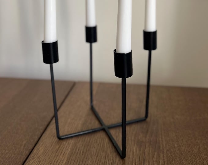 4-armed black metal Candelabra. Scandinavian style.