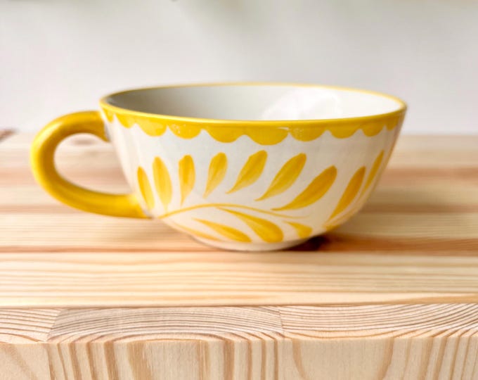 Teacup decorated with yellow leaves, by Indiska 1901. Scandinavian design. made in Sweden.