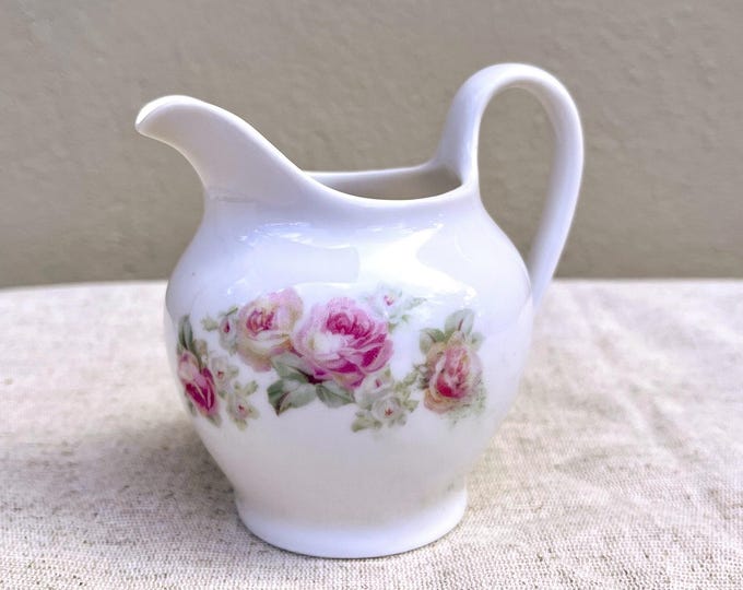 Vintage Porcelain Milk jug with floral pattern from 1900s. ALP Lidköping ceramic. Made in Sweden.