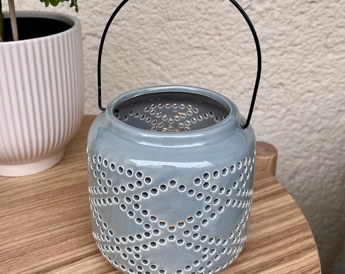 Blue ceramic tea light holder. Scandinavian design.