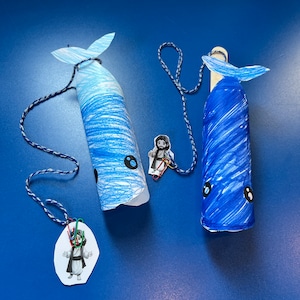 Whale Craft with popsicle stick, yarn, and paperclips for a Children's Church Jonah and the Whale Activity.