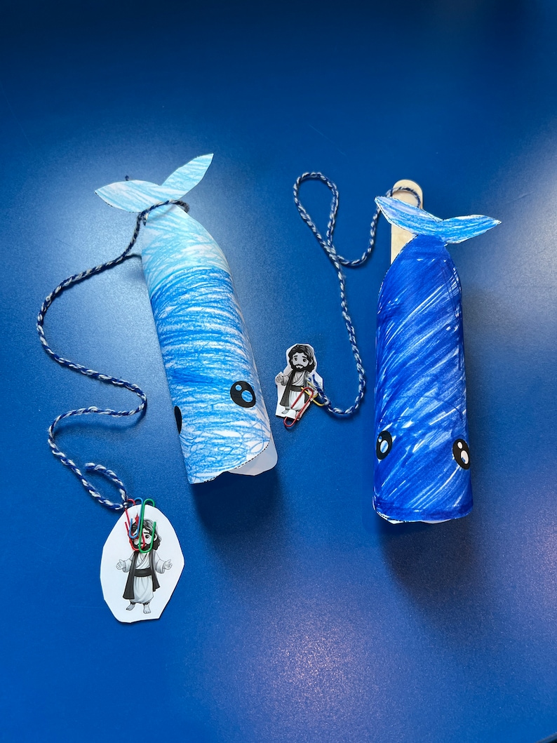 Whale Craft with popsicle stick, yarn, and paperclips for a Children's Church Jonah and the Whale Activity.
