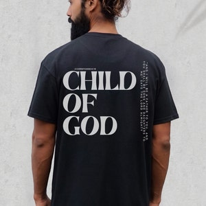 May include: Black t-shirt with white text that reads "CHILD OF GOD" and a Bible verse from 2 Corinthians 6:18.