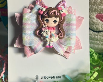 Easter girl hair bow - faux leather hair bow on an alligator clip with a center clay figure. Perfect for easter pictures and hairstyle.