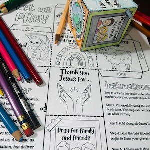 May include: A printable prayer cube craft for kids. The cube has six sides with different prayer topics, including "Pray for the World", "Pray for Family and Friends", "Thank You Jesus For...", and "I am worried about..." The cube is black and white and ready to be colored in.