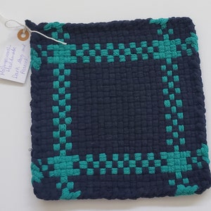 Navy solid with teal/peacock border potholder