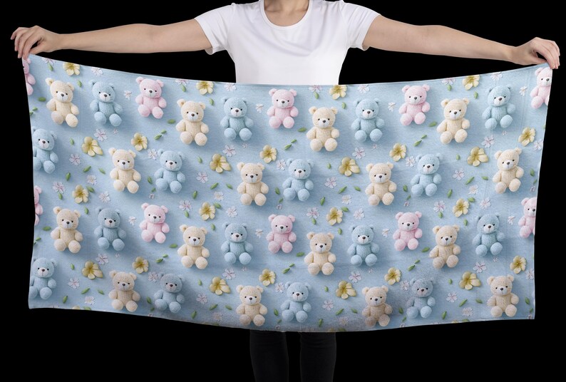 May include: A light blue blanket featuring a repeating pattern of teddy bears in pastel colors: beige, light blue, and pink. Small yellow flowers and green leaves are scattered throughout the design.