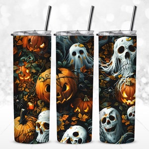 May include: A set of three stainless steel insulated tumblers with Halloween-themed designs. Each tumbler features a different design: jack-o'-lanterns, ghosts, and skulls, set against a backdrop of autumn leaves and dark foliage. Includes a silver straw.