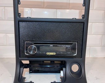 1986-1988 Rx7 single din radio insert.