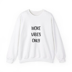 Unisex Heavy Blend  Crewneck Sweatshirt Woke Vibes