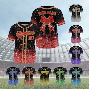 May include: A set of ten baseball jerseys with a glitter design. The jerseys are in various colors, including red, gold, green, blue, and purple. The jerseys have a bow and the text "Cheer 2025" on the back. The jerseys have the text "Teamname 00" on the front.