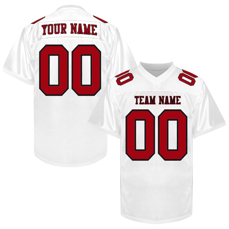 Puede incluir: Camiseta de f&uacute;tbol blanca con detalles rojos, con el n&uacute;mero "00" y el texto "YOUR NAME" en la espalda. Otra camiseta muestra "TEAM NAME" y el n&uacute;mero "00". Ambas camisetas tienen el n&uacute;mero "10" en los hombros.