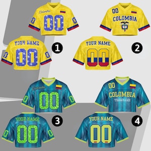 May include: A collection of yellow and blue cropped jerseys with the text "Colombia" and "00". Some jerseys have the text "YOUR NAME" and a team logo. The jerseys have red and blue accents.