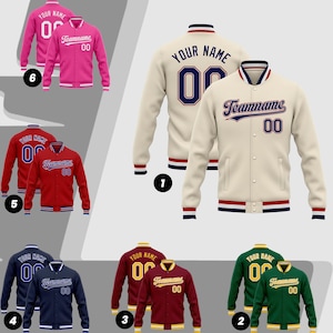 May include: A collection of letterman jackets in various colors, including cream, red, navy, maroon, green, and pink. Each jacket features a contrasting collar, cuffs, and waistband, with the text "Your Name" and "Teamname" along with the number "00".