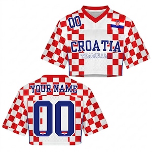 May include: Croatia team jersey with a red and white checkered pattern. The jersey features the word "CROATIA" in blue, along with the number "00" and the Croatian flag. The back of the jersey has the text "YOUR NAME" and the number "00".