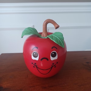 Vintage Fisher Price Musical Happy Apple Baby Chime Toy 1972