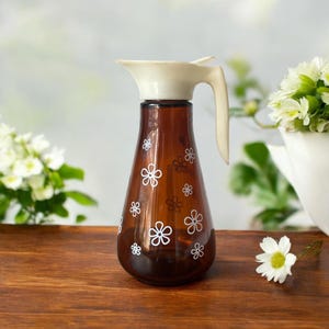 Vintage Thatcher Brown Glass Syrup Pitcher With White Daisy Flower Decals White Plastic Lid 1960s