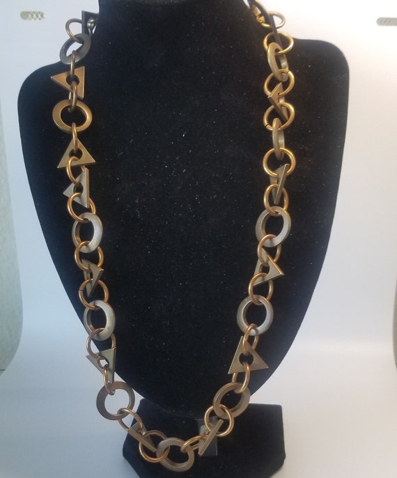 Unisex artisan-made brass necklace.