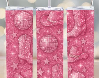 May include: Three pink glitter tumbler cups with a cowgirl theme. The tumblers feature a repeating pattern of pink glitter, cowboy hats, boots, and disco balls.