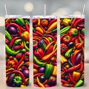May include: A stainless steel tumbler with a vibrant, colorful design of various chili peppers, bell peppers, and other vegetables. The design features red, green, yellow, and orange peppers, with a silver straw and lid.