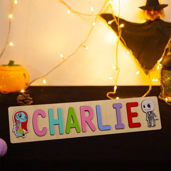 A Halloween-themed custom name puzzle with cute ghost illustrations — rare seasonal-personalized crossover that makes a genuinely fun October birthday or holiday gift.