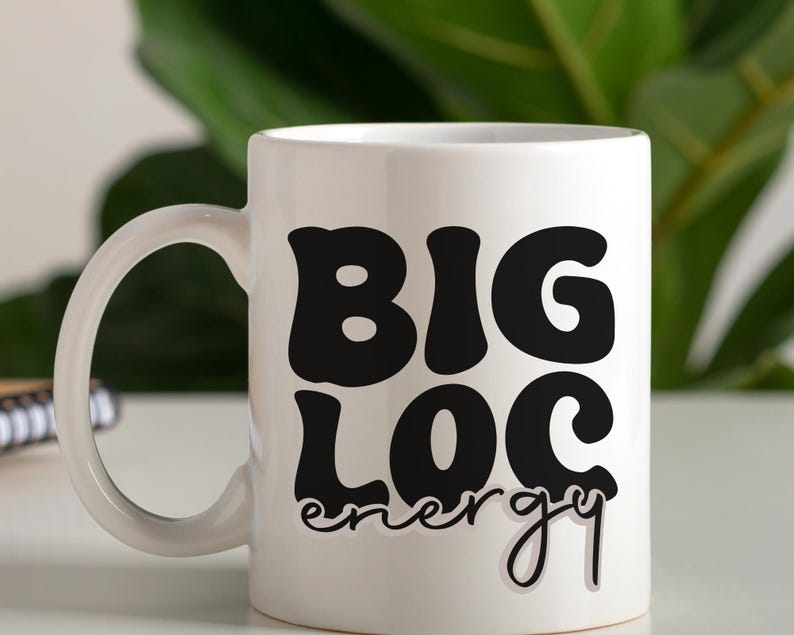 May include: White ceramic mug with a black graphic that says "BIG LOC energy" in a retro font.