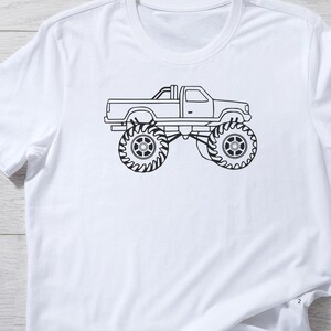 May include: A black and white line drawing of a monster truck on a white t-shirt.