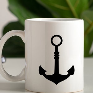 May include: White ceramic mug with a black anchor design. The anchor has a rounded top and a thick base.