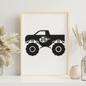 May include: Black and white silhouette of a monster truck with flames on the side. The truck is on a white background.