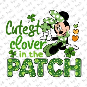 May include: A green and white cartoon character holding a four-leaf clover. The text "Cutest clover in the patch" is written in green letters with a green shamrock pattern.