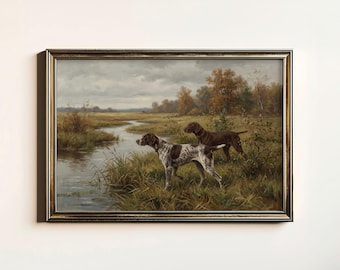May include: A framed painting showing two hunting dogs in a marshy landscape. One dog is brown and white, the other is solid brown. The artwork features a river, tall grass, and trees under a cloudy sky.
